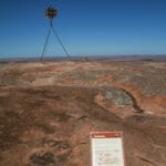 Trig point and gnammas on Mount Wudinna, South Australia