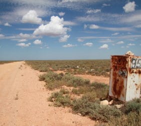 Rusty box road marker on Cook Road, 95Km to Eyre Highway