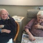Leonie's Dad (left) and his brother Jack tackling a word puzzle in Gumeracha Hospital