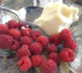 Enjoying local raspberries from Leonie's cousin