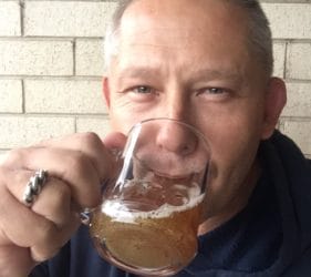 Vic enjoying a swig of the brew